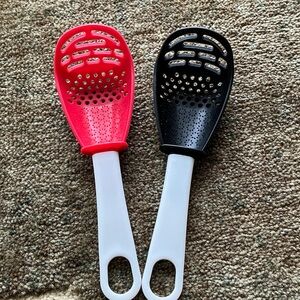 Red and Black Slotted Kitchen Spoons